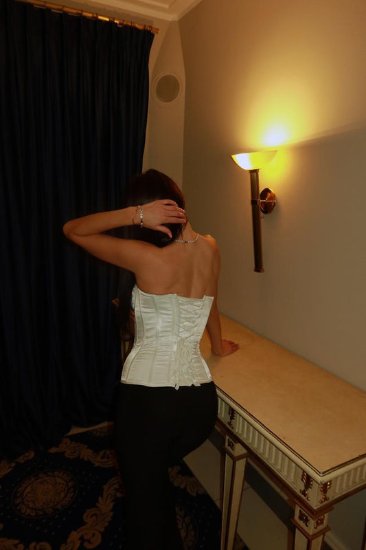 Cream satin corset from the Royal Satin Corset Creme Edition, featuring elegant design and smooth fabric details.